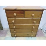 A pine chest of six drawers