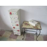 A painted set of narrow drawers along with a mosaic style coffee table etc.