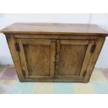 A 19th century oak and elm cupboard