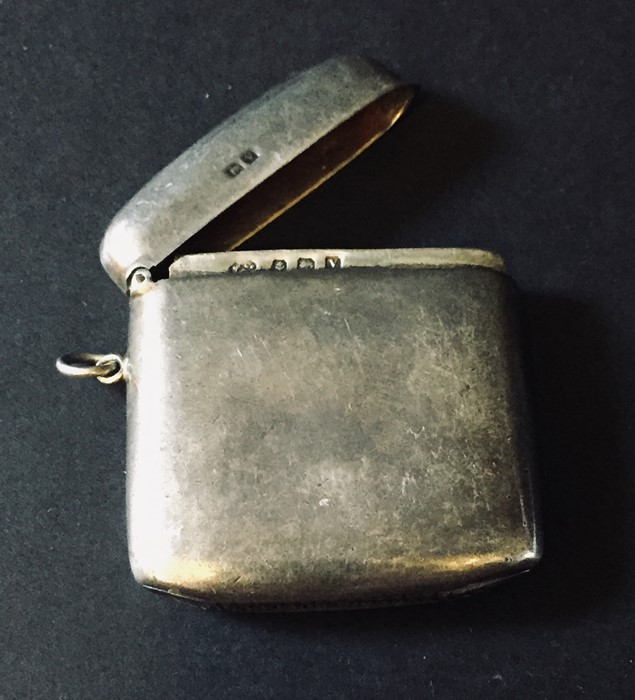 A hallmarked silver vesta along with a silver caddy spoon and silver sovereign case. - Image 4 of 5