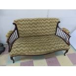 An Edwardian two seater settee