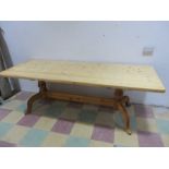 A pine table on pedestal legs - 7ft 6"