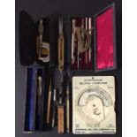 A collection of drawing and similar items including an A Edgell & Co brass divider