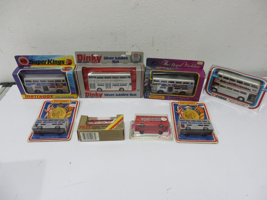 A collection of 8 boxed diecast buses including Dinky, Corgi and Matchbox