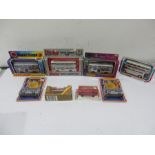 A collection of 8 boxed diecast buses including Dinky, Corgi and Matchbox
