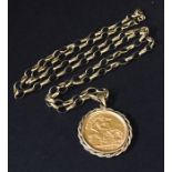 A 1958 sovereign in 9ct mount with chain. Total weight 17g