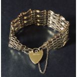 A 9ct gold gate bracelet. Weight 13.6g