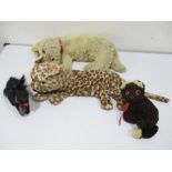 Vintage plush dog pyjama case along with one other and two soft toys