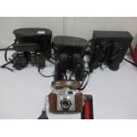 Three pairs of binoculars including Chinon Sportsman along with a Zeiss Ikon vintage camera ( case