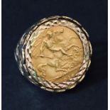 A 1914 half sovereign set in a 9ct ring. Total weight 8g