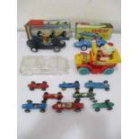 A collection of various die cast and other racing cars etc. including Dinky and Corgi