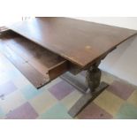 An oak refrectory style map table with single drawer