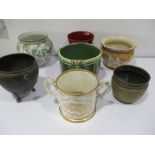A collection of various jardinieres along with a Victorian two handled loving cup A/F