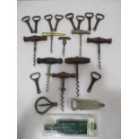 A collection of corkscrews and bottle openers