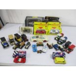 A collection of model cars including Maisto, Corgi etc.