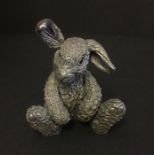 A 925 silver model of a rabbit.