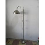 A modern metal adjustable standard lamp