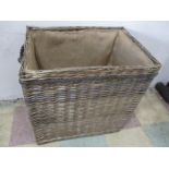 A wicker log bin