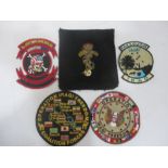 A small collection of millitary badges/patches
