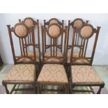 A set of six oak Charles Rene Mackintosh inspired dining chairs