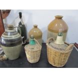 A collection of stoneware jars, studio pottery cider flagon etc.