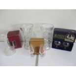 A pair of large cut glasses vase along with three boxed crystal glass sets including Royal Doulton