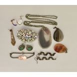 A small quantity of costume jewellery including agate pendants etc.