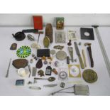 A collection of miscellaneous small interesting items including pen knives, button hook, parasol