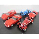 A collection of five Burago cars