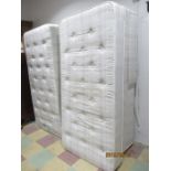 A pair of single Divan beds with mattresses