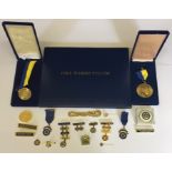 A collection of Rotary memorabilia including silver medals, medallions etc