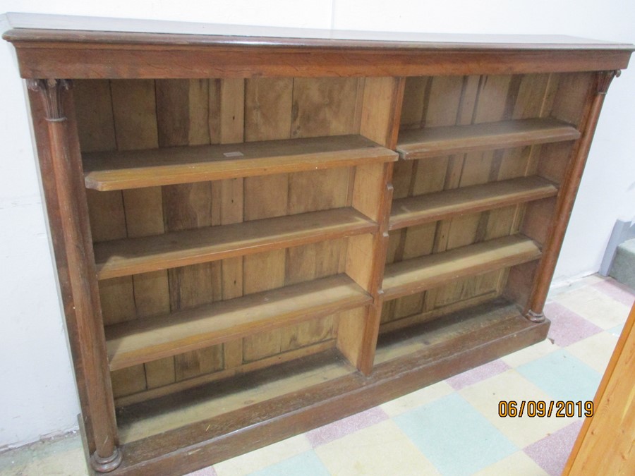 A Victorian oak freestanding bookcase with column design - approx 190cm wide