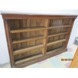 A Victorian oak freestanding bookcase with column design - approx 190cm wide