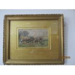 A small framed watercolour of collecting hay, unsigned