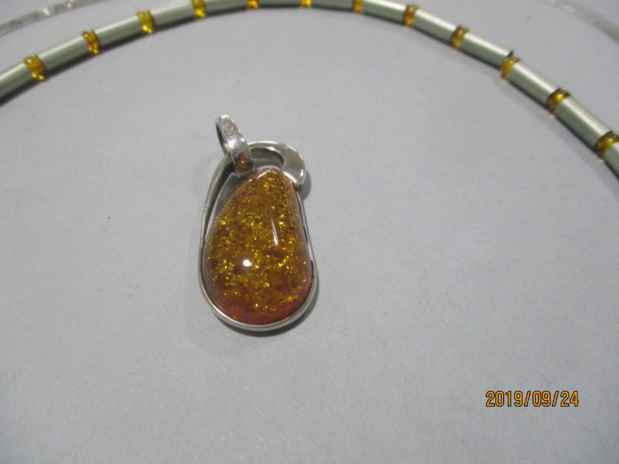 Three 925 silver necklaces along with one other, amber silver pendant and a pair of earrings. - Image 3 of 6