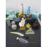 A collection of Avon and other perfume bottles etc.