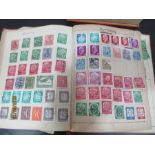 A collection of worldwide stamps along with a Stanley Gibbons catalogue ( 1967)