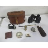 A collection of miscellaneous items including binoculars, silver photo frame, lighter, compass etc