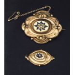 A Victorian mourning brooch with enamel and seed pearl along with similar pendant.