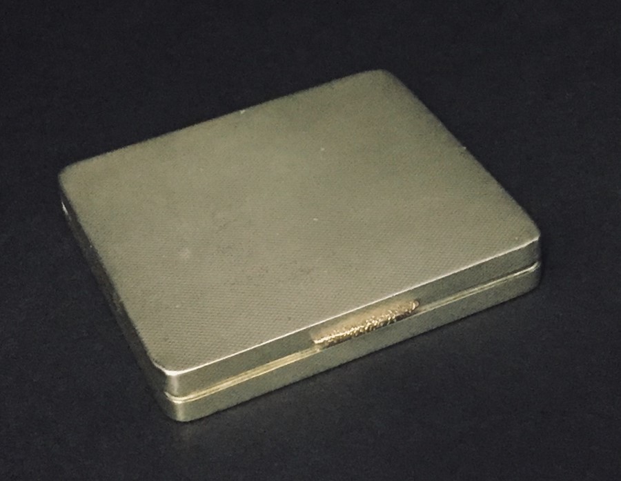 A hallmarked silver compact