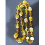 An amber necklace, weight 66.5g