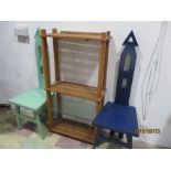 Two painted hall chairs along with a towel rack