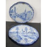 A pair of 19th century Delft plaques signed to reverse, approx 50cm width
