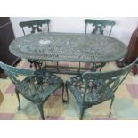 A metal garden table and four chairs