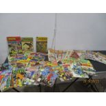 A collection of vintage comics including Tarzan, Marvel, DC, Korak,Beano etc