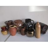 A collection of pottery jugs, barrel, pots etc