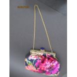 A vintage silk plush handbag with bejewelled top