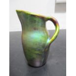 A Zsolnay jug with Eosin glaze c1900, raised five church mark to base, height approx 17cm