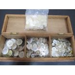A collection of mainly mother of pearl buttons