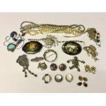 A collection of silver and other jewellery.